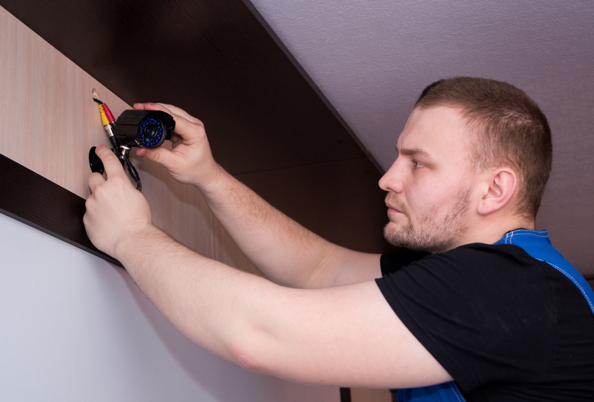 A maintenance technician at work inside a home